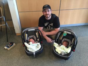 Father and his newborn twins at MGH's Vincent Obstetrics after completing The Fatherhood Project's Father Engagement Survey