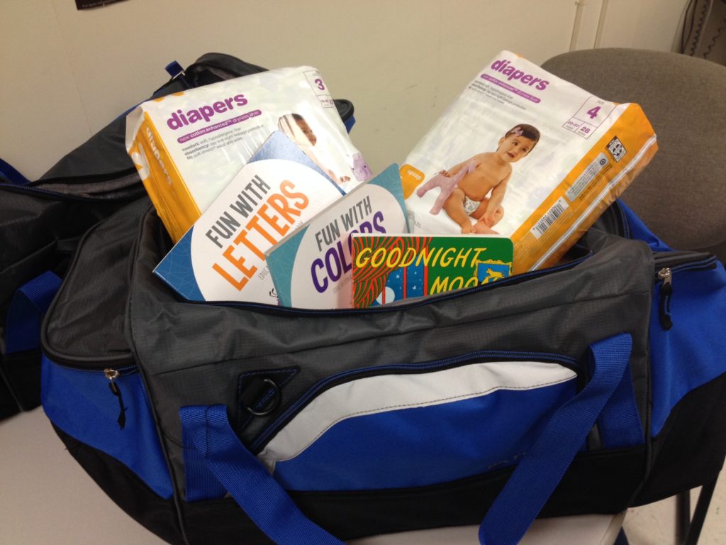 The Fatherhood Project Teen Dads Kit: Duffel bag with diapers and children's books